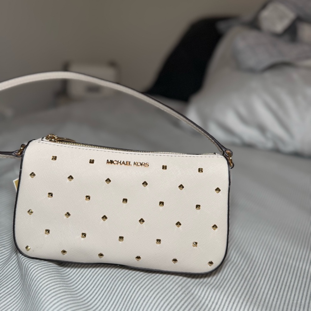 Michael Kors Cream Wristlet with Gold Accents
